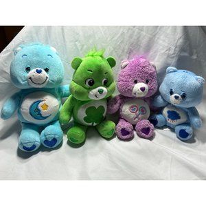 Care Bear plush stuffed animals lot of four Preowned in good condition